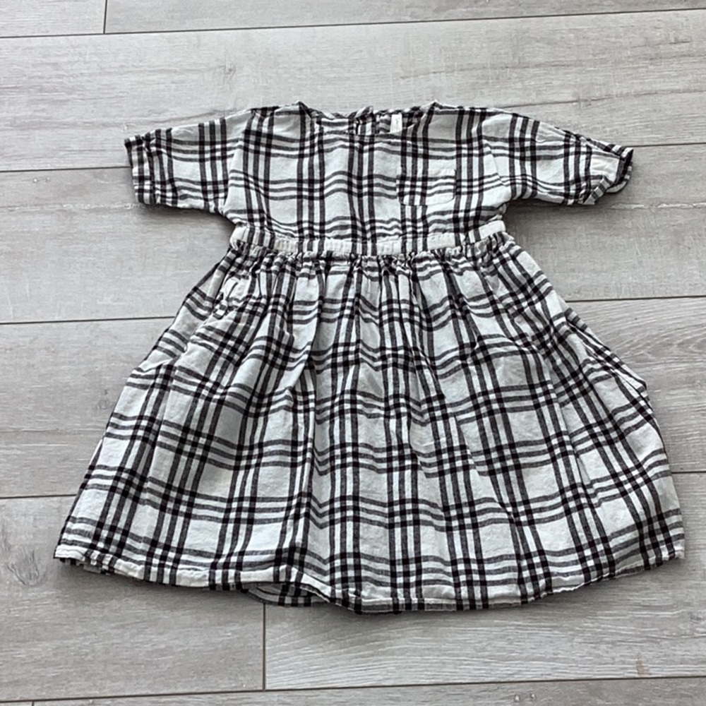 Rylee and Cru tunic with button down back and a pocket on the front.
